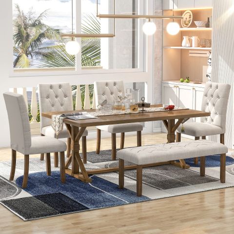 Wooden dining tables that complement upholstered chair collections